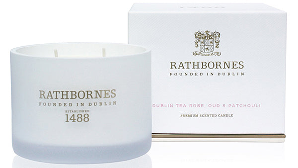 Tea rose scented candle in a white ceramics pot 