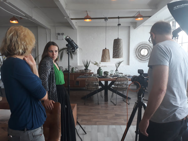Our lovely team discussing behind the scenes of our photoshoot