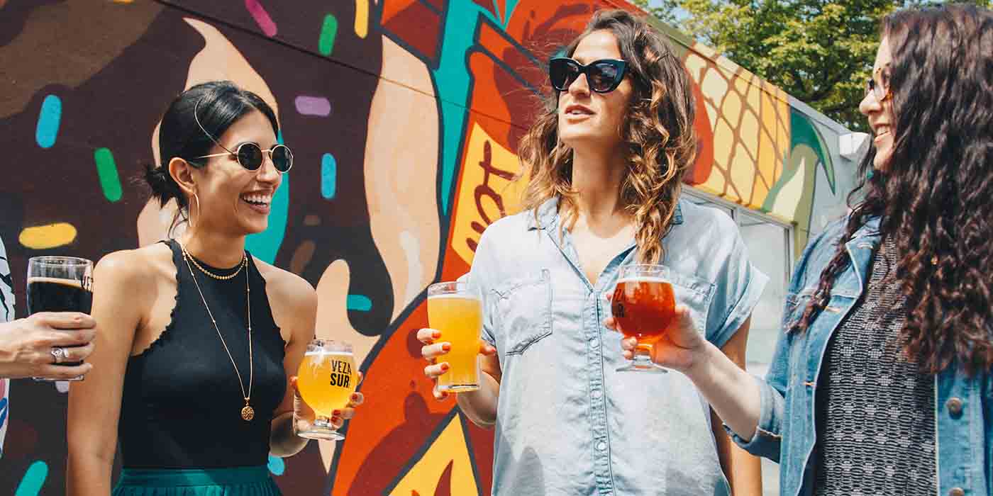 3 Women Talking in Garden