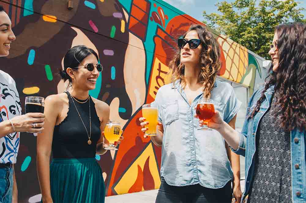 4 Women Chatting in Garden