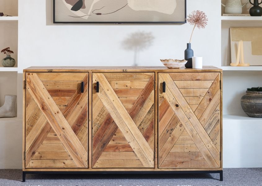 reclaimed wood sideboard with single vase and bowl
