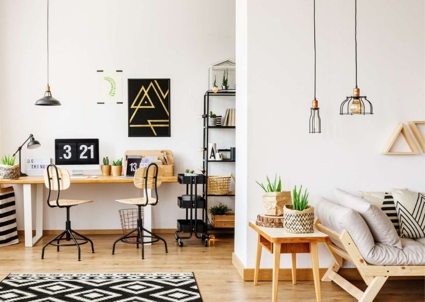 home office space with wooden desk in open plan living room