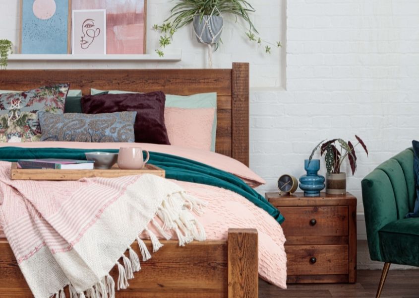 reclaimed wood bed with wooden bedside table