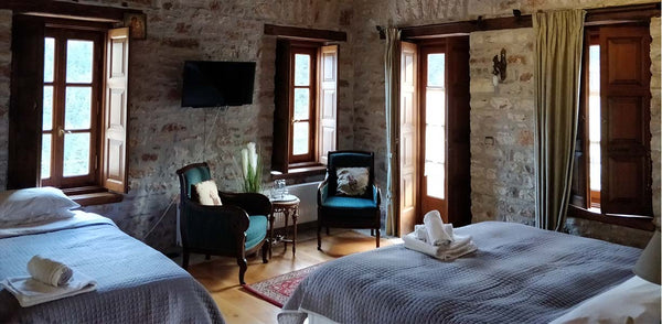 Beds in Bedroom with Reclaimed Wood Side Table