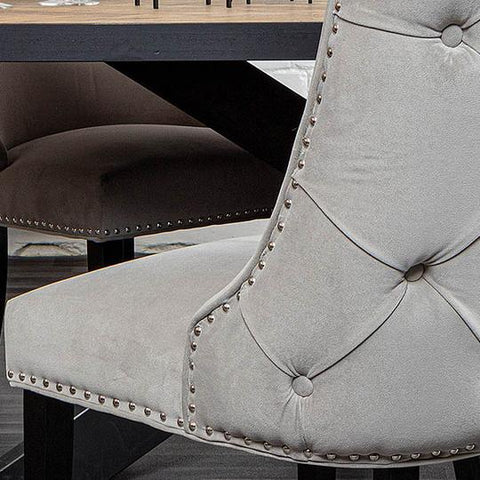 Button back detailing on velvet fabric dining chair