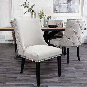 Cream velvet dining chair with button back detail