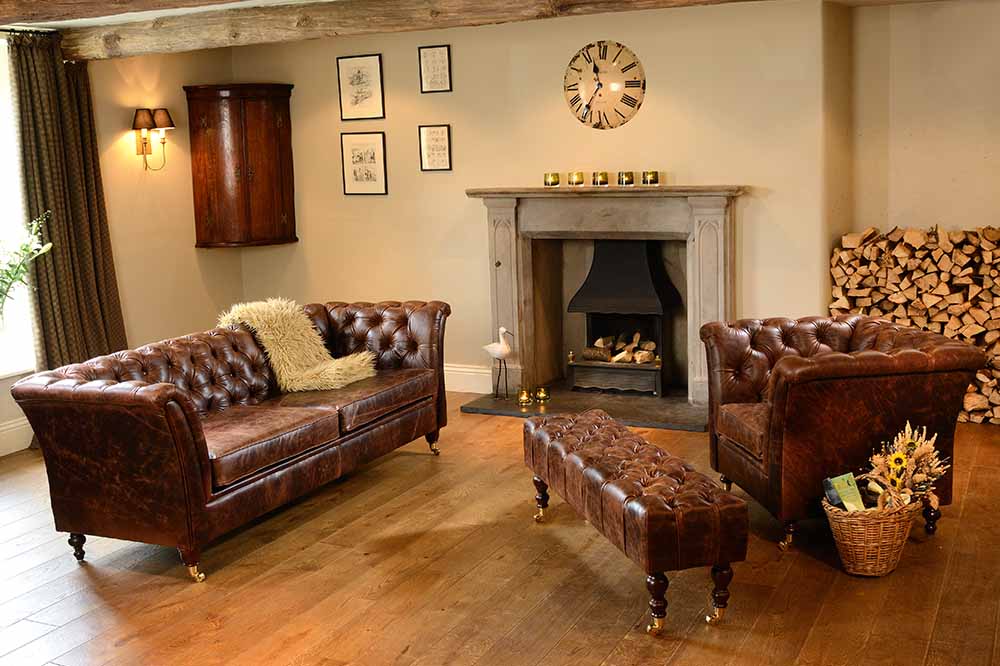 Brown Leather Armchair and Leather Sofa