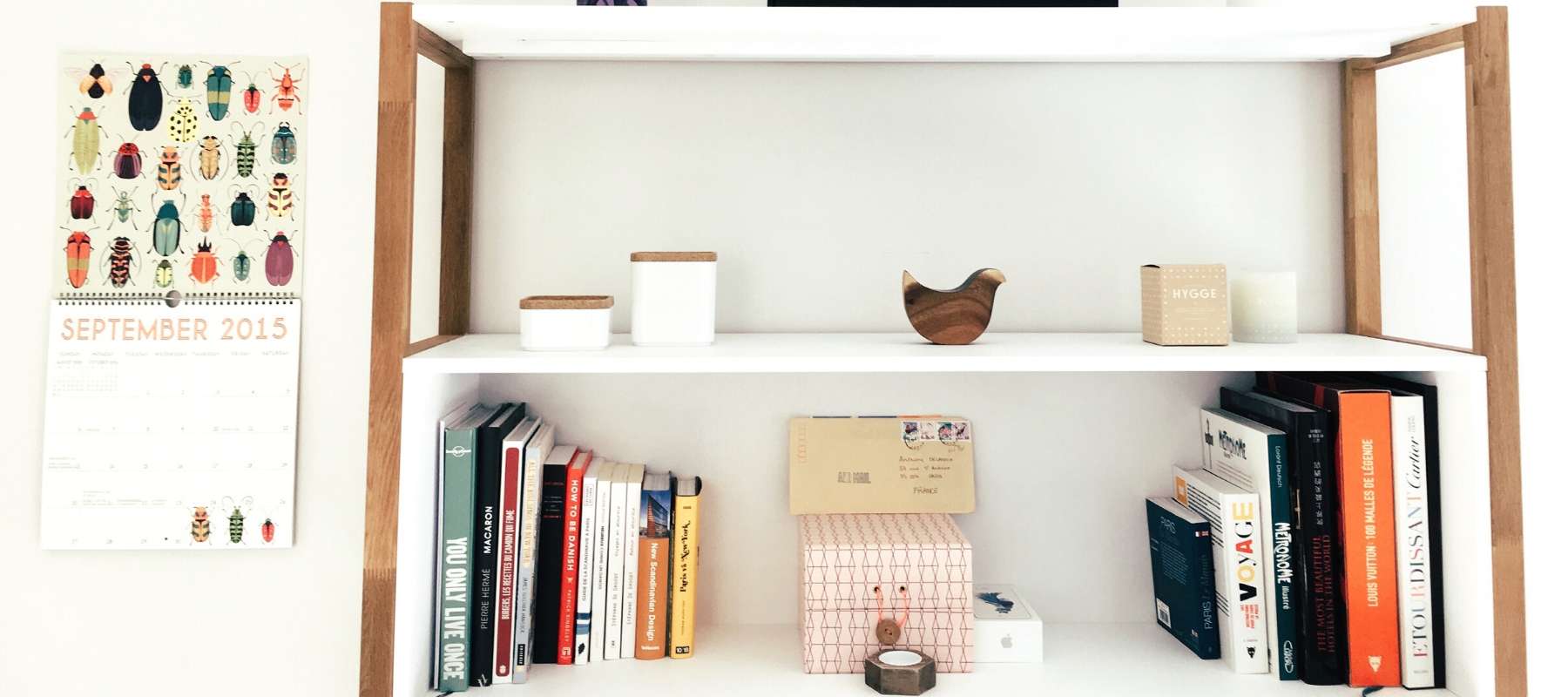 Display case with books and trinkets