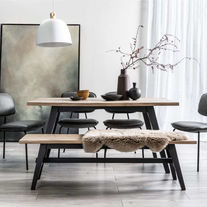 reclaimed wood dining table with black painted legs