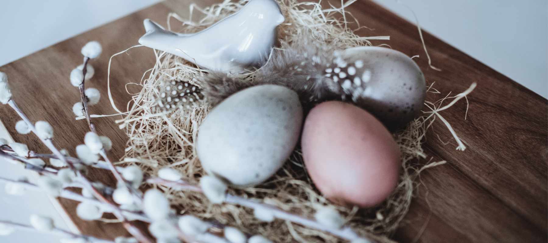Painted eggs on reclaimed wood table