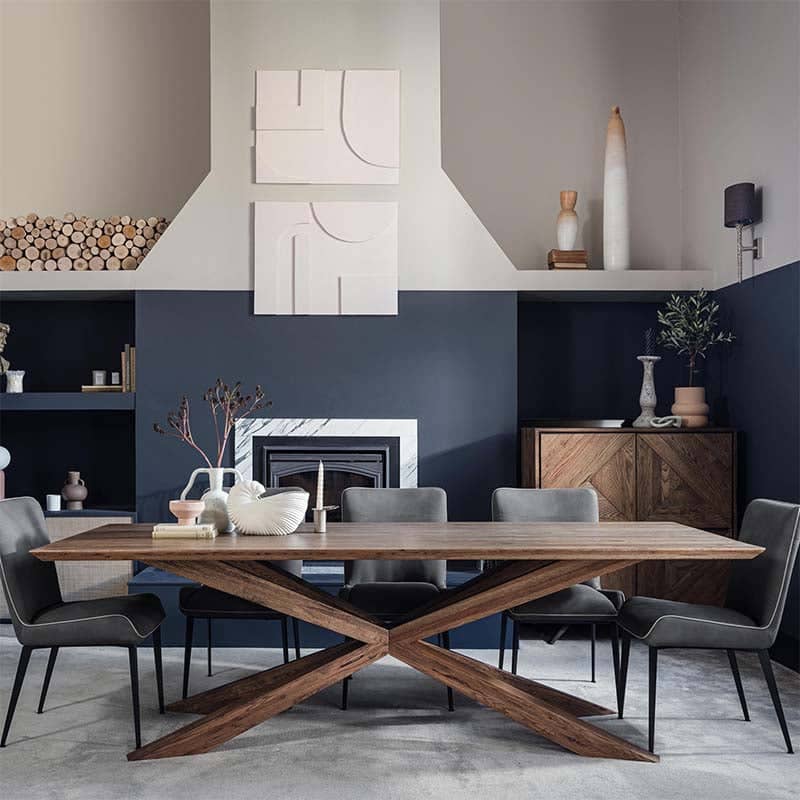 Rustic dining table with fabric dining chairs and white linen table runner