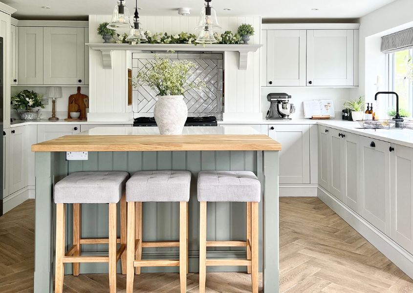 modern farmhouse kitchen with island and fabric bar stools