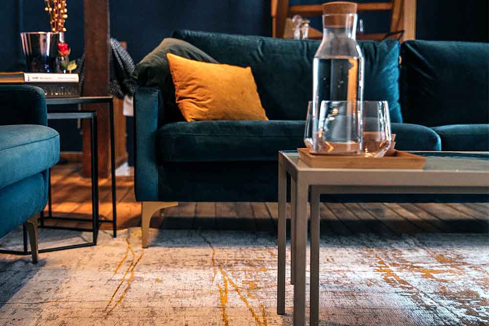 Louis de Poortere Columbus Gold Rug in Living Room