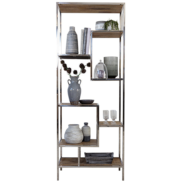 A display unit made of reclaimed elm with ceramics and plants in the compartments