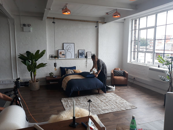 Gemma Gear behind the scenes at a bedroom photoshoot for Timberly