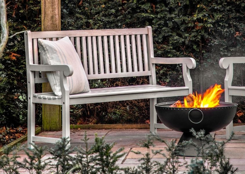 2 seater bench seat with cushion and firepit