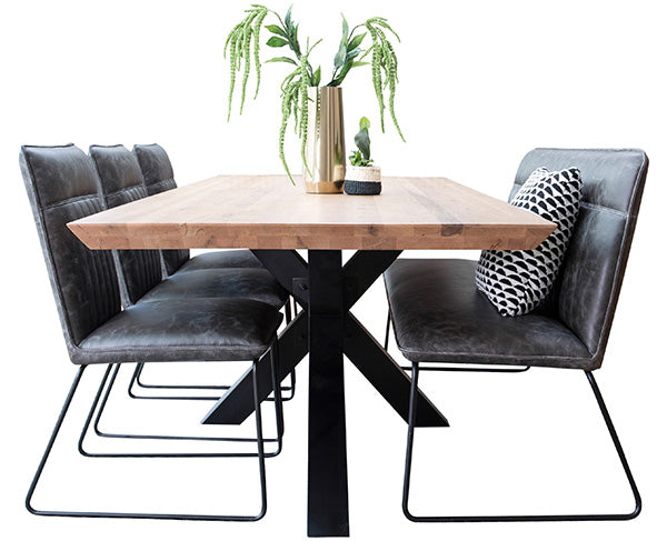 An Industrial and Rustic Oak Spider Leg Dining Table