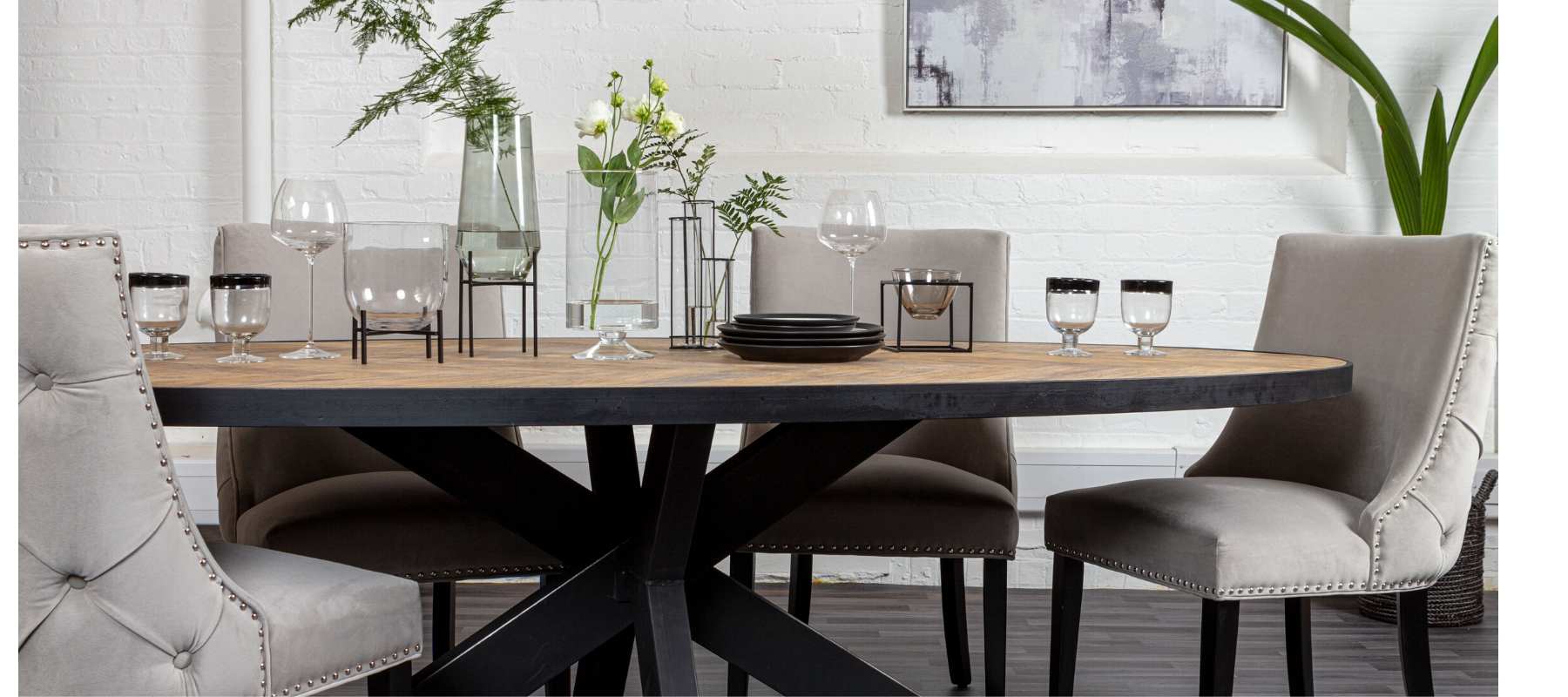Oval dining table with grey fabric dining chairs