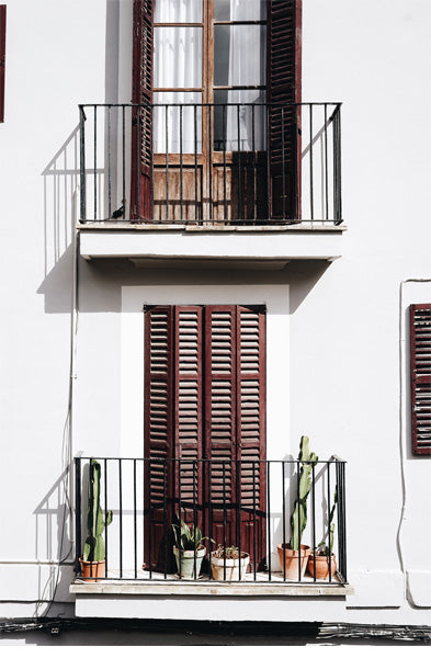 White Wall and Wooden Doors