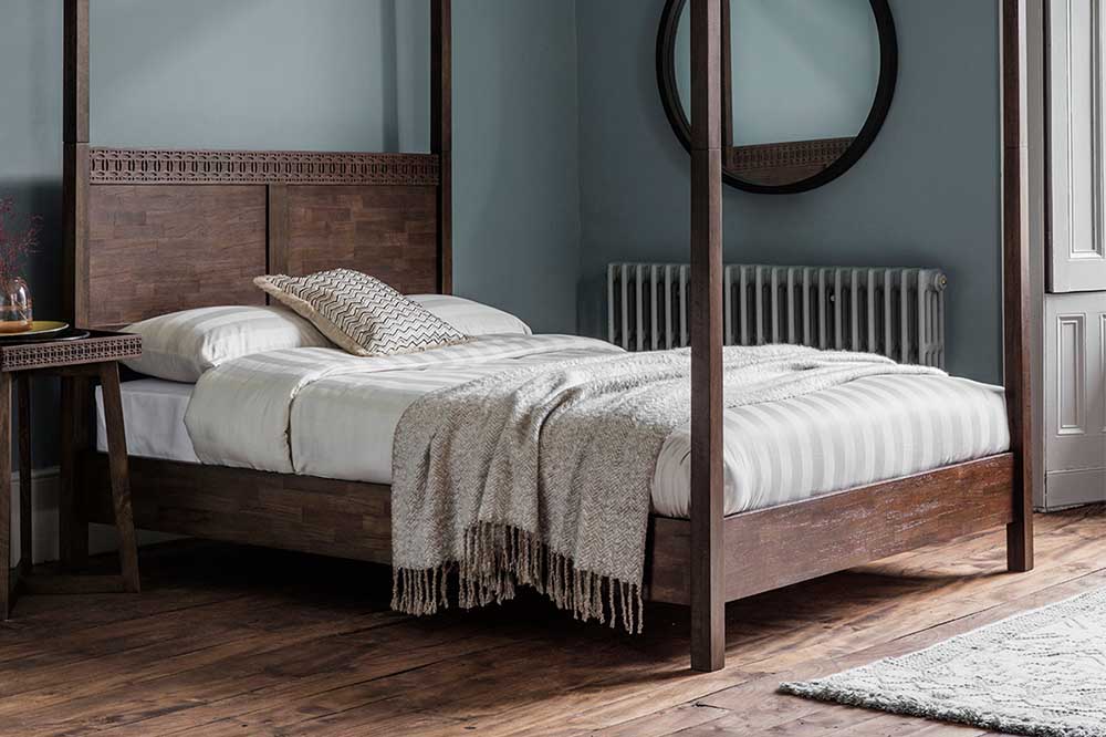 Wooden Four Poster Bed in Bedroom