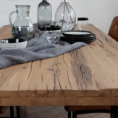 close up of reclaimed wood dining table