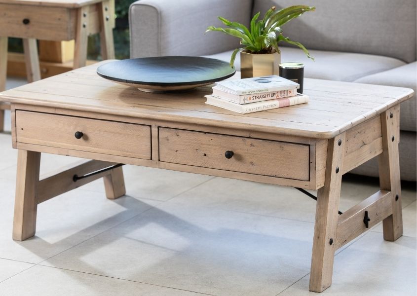 reclaimed wood coffee table with two drawers and black round metal handles