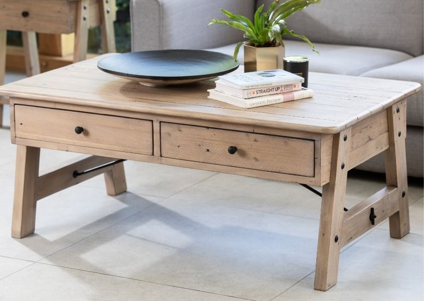 Reclaimed wood coffee table with two drawers and trestle style legs