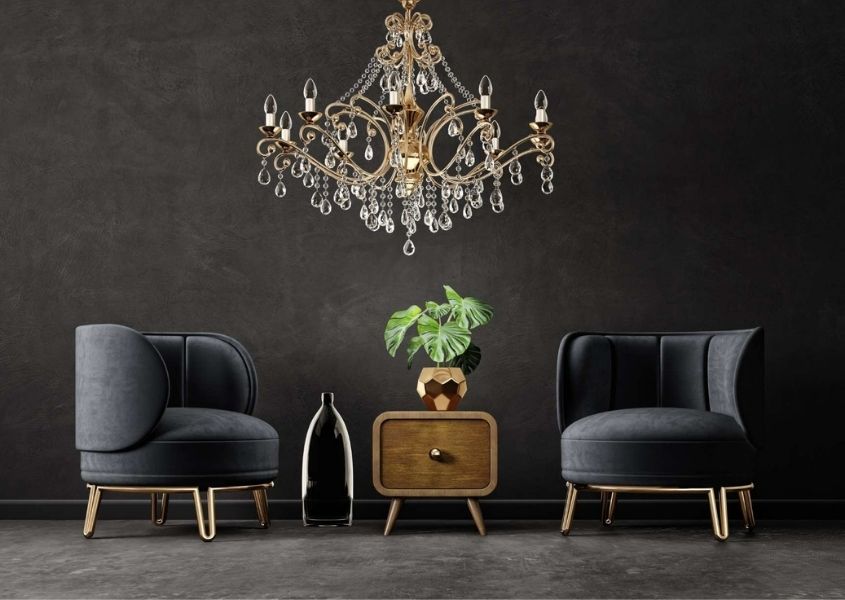 dark living room with grey fabric armchairs and wooden side table