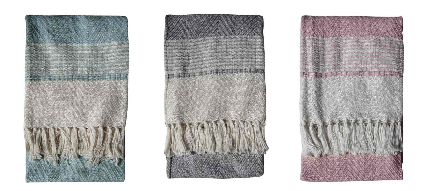 Blue, grey and pink blankets