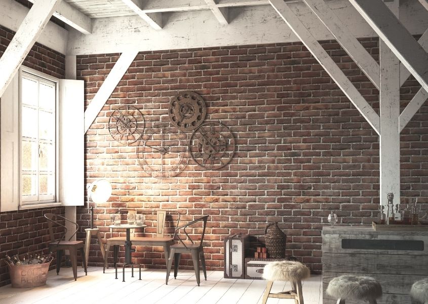 rustic living room with wooden panelled wall and rustic furniture