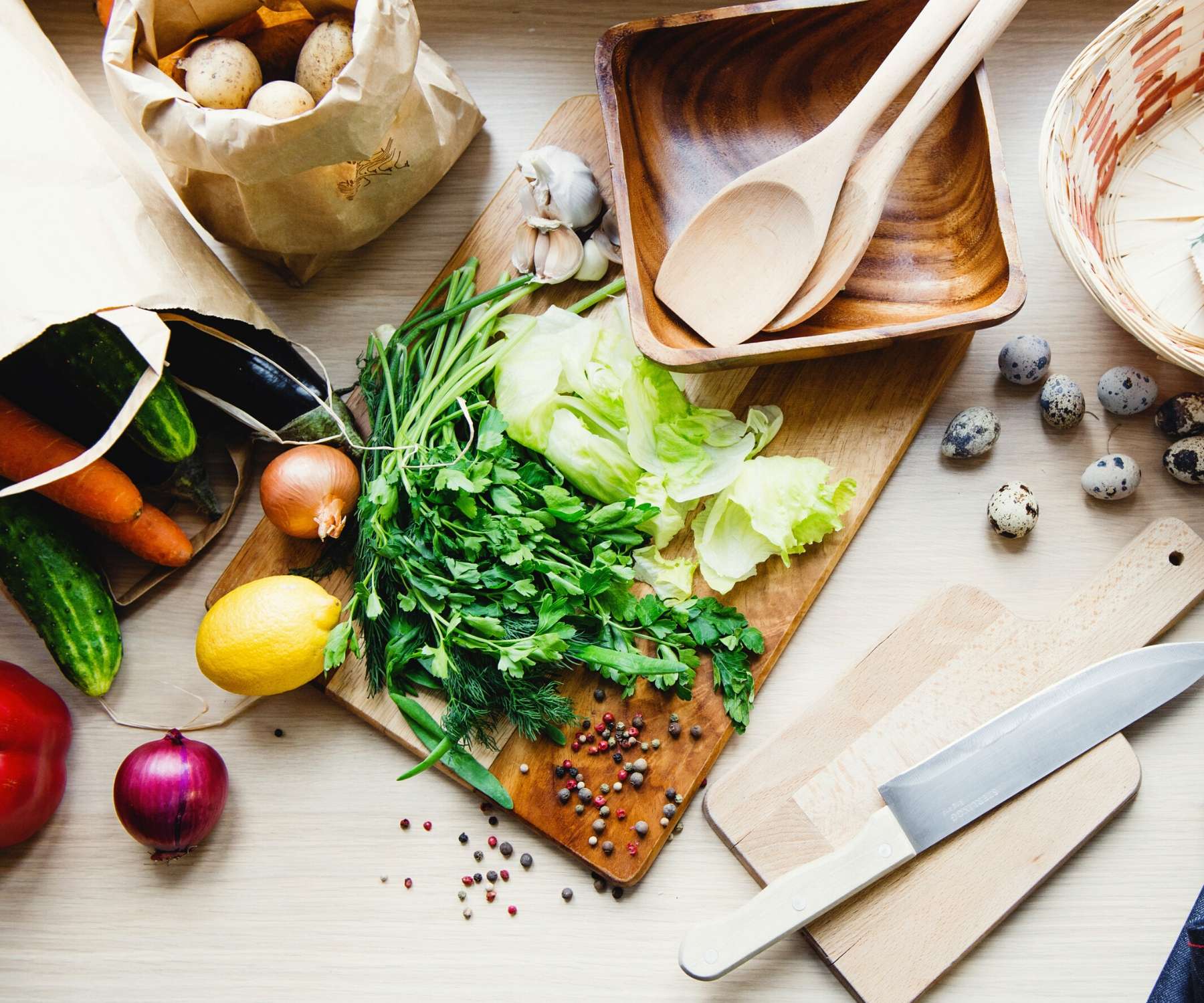 fresh vegetables and salad on a chopping board