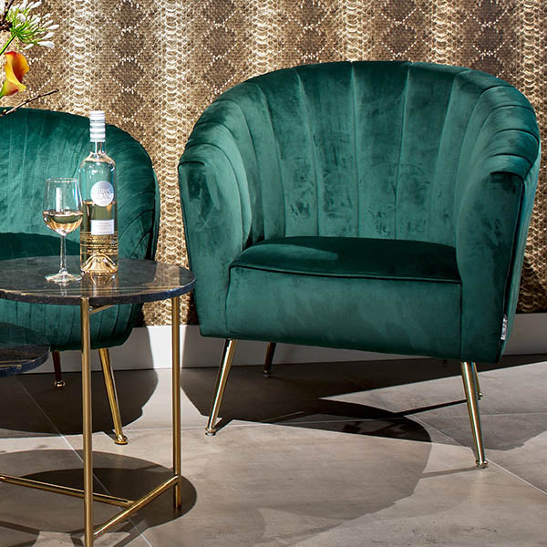 Dark green velvet shell chair with gold legs