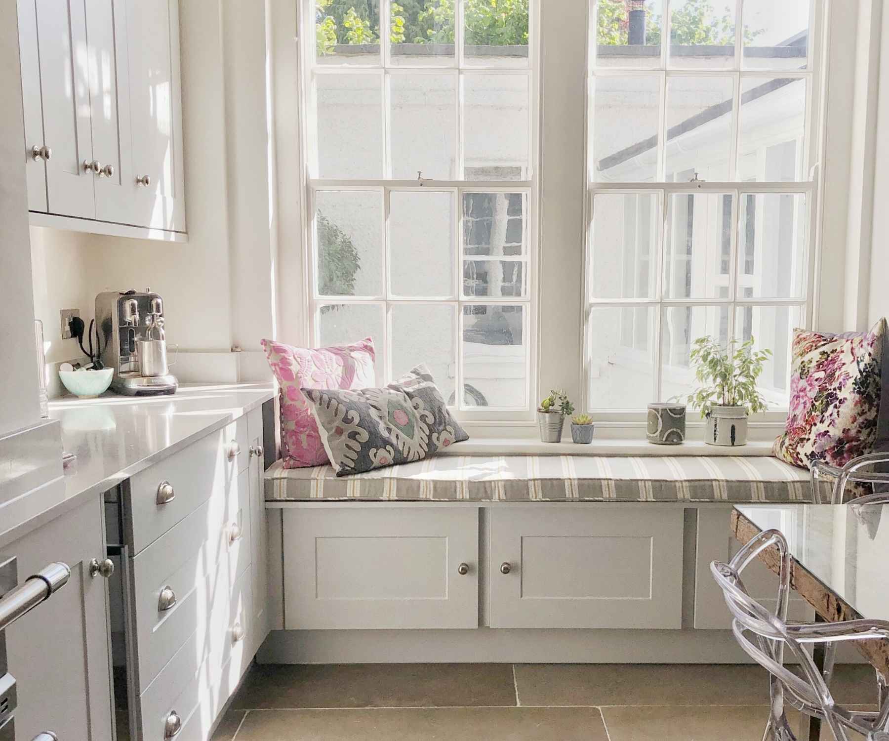 Large kitchen window with built in seating