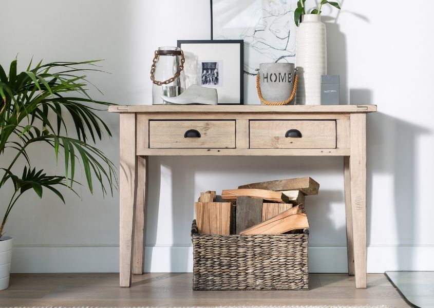 reclaimed wood console table with basket of wood