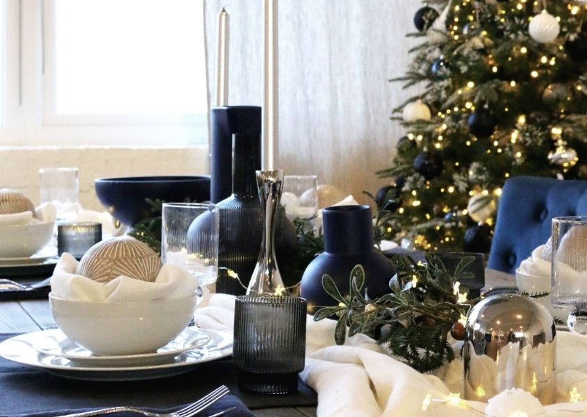 christmas rustic dining table with christmas tree in background