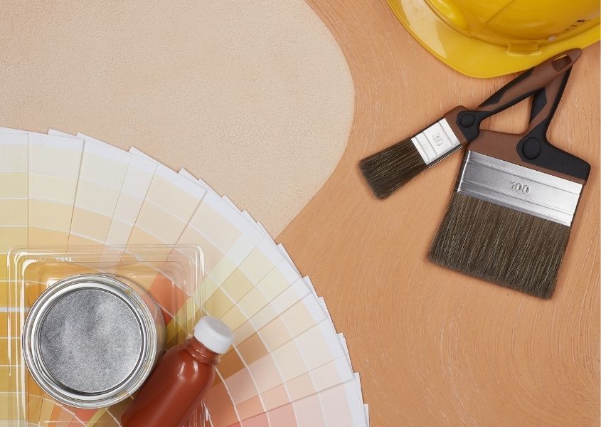 paint sample pots and paint brush for how to use 60-30-10 colour rule