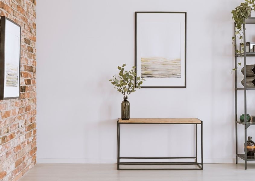 industrial console table in hallway
