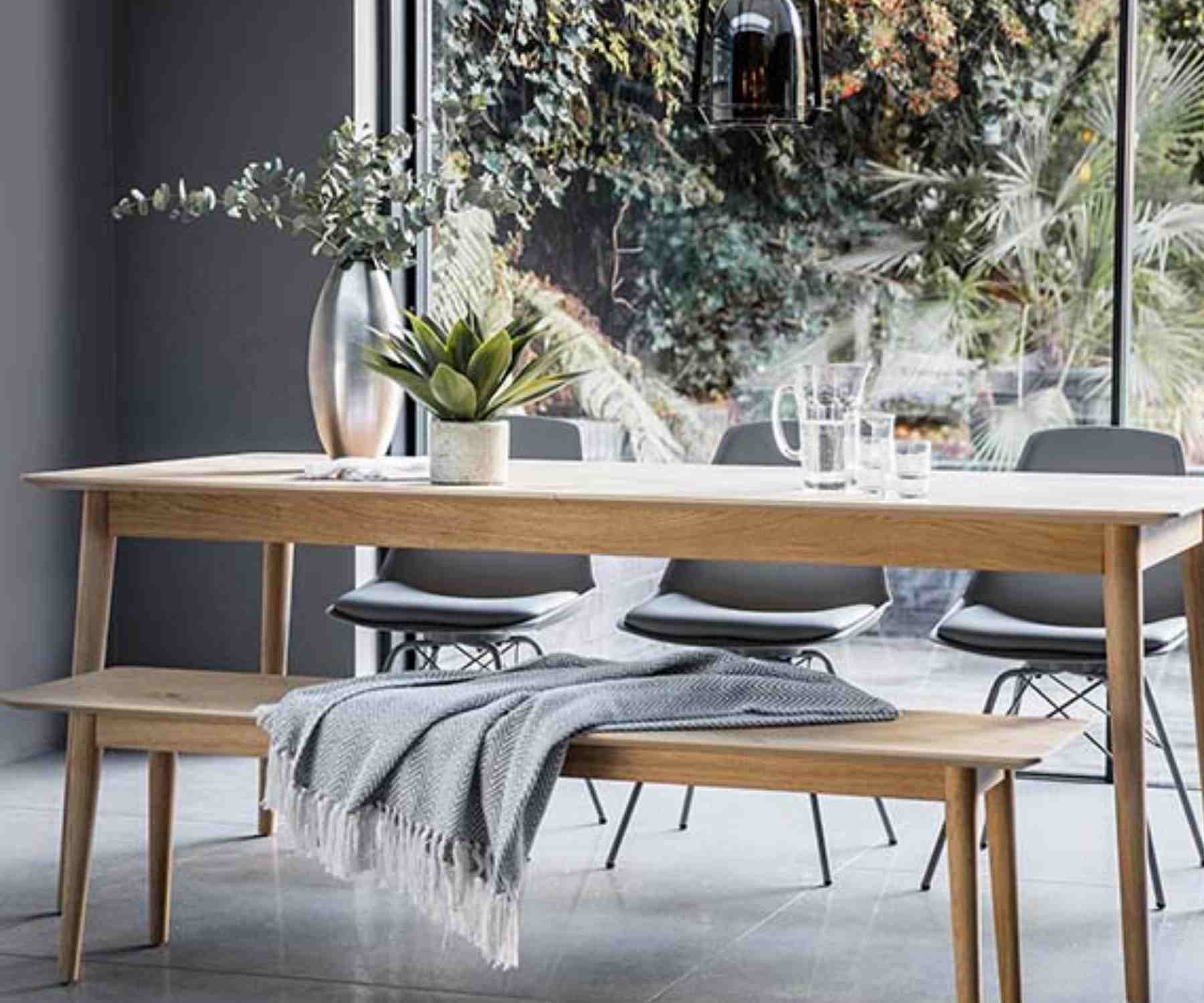 Pale oak dining table with matching bench