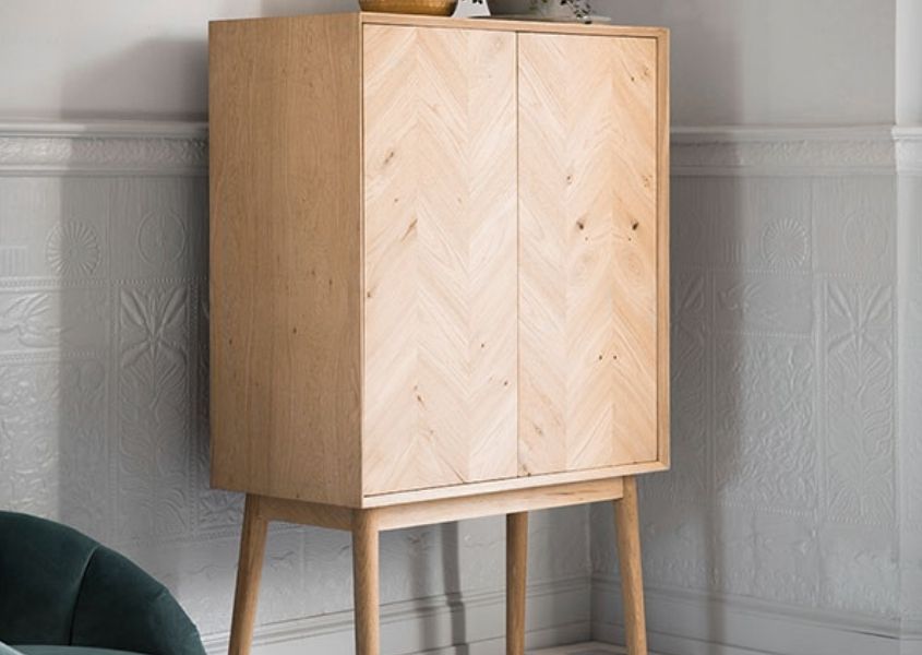 Light oak drinks cabinet with chevron design