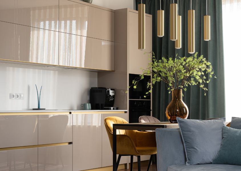 small dining space in a white kitchen with wooden dining table