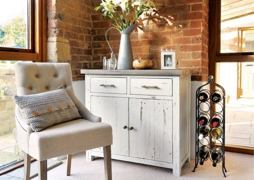 white wooden sideboard with beige dining chair