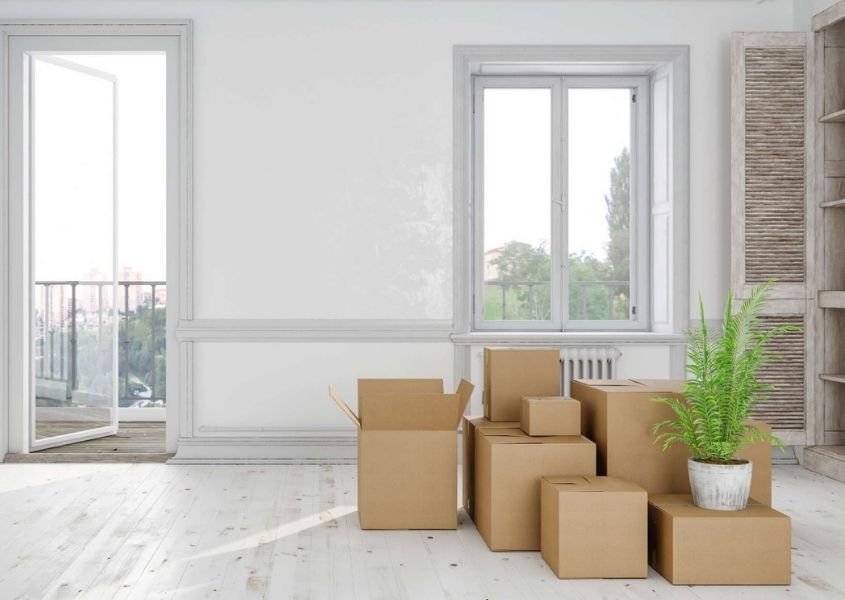 stack of removal boxes for tips to prepare for an easy house move blog