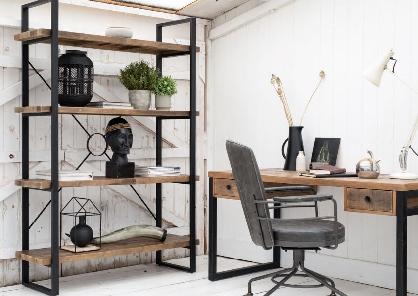industrial desk and wooden bookshelf