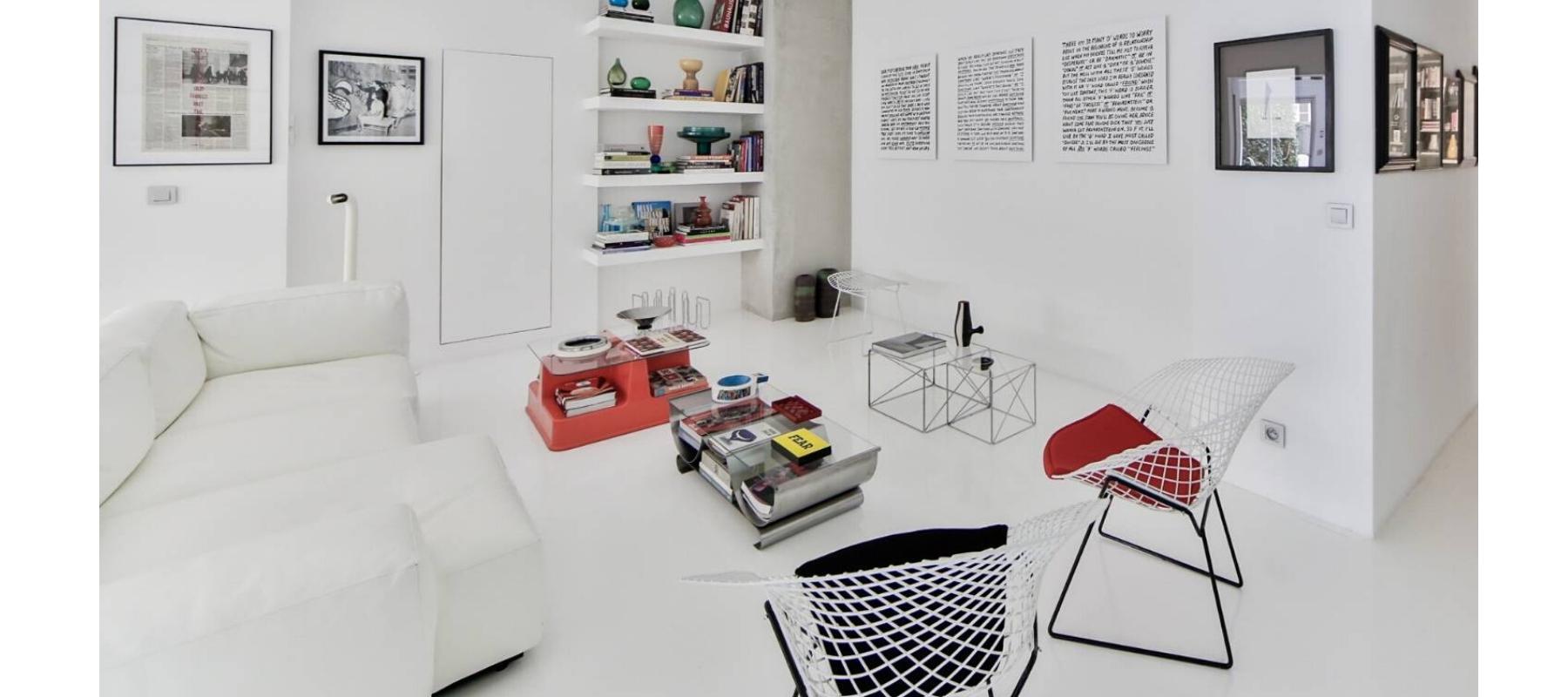 White living room with sofa and coffee table