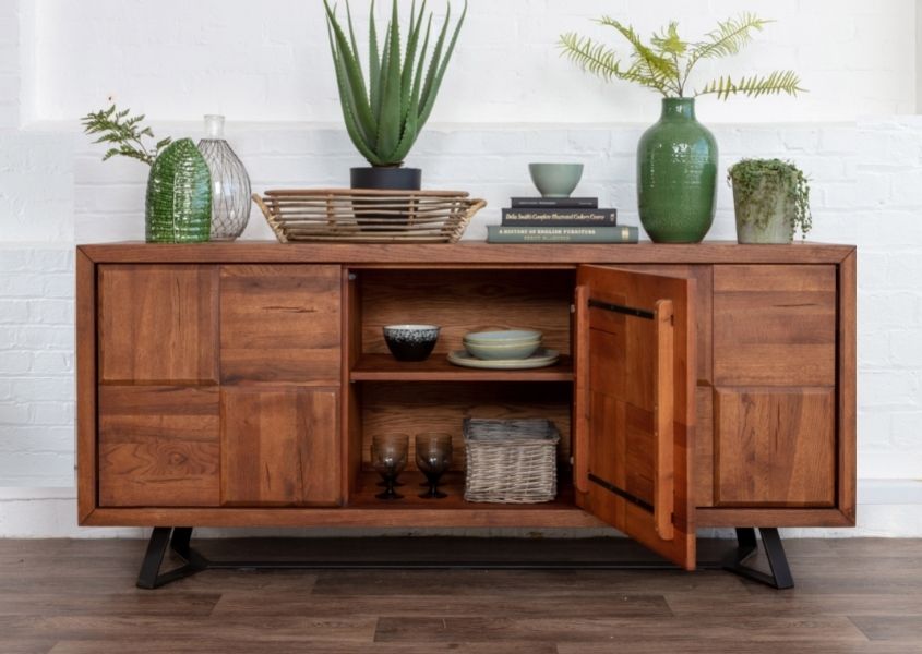 wooden sideboard with middle door open